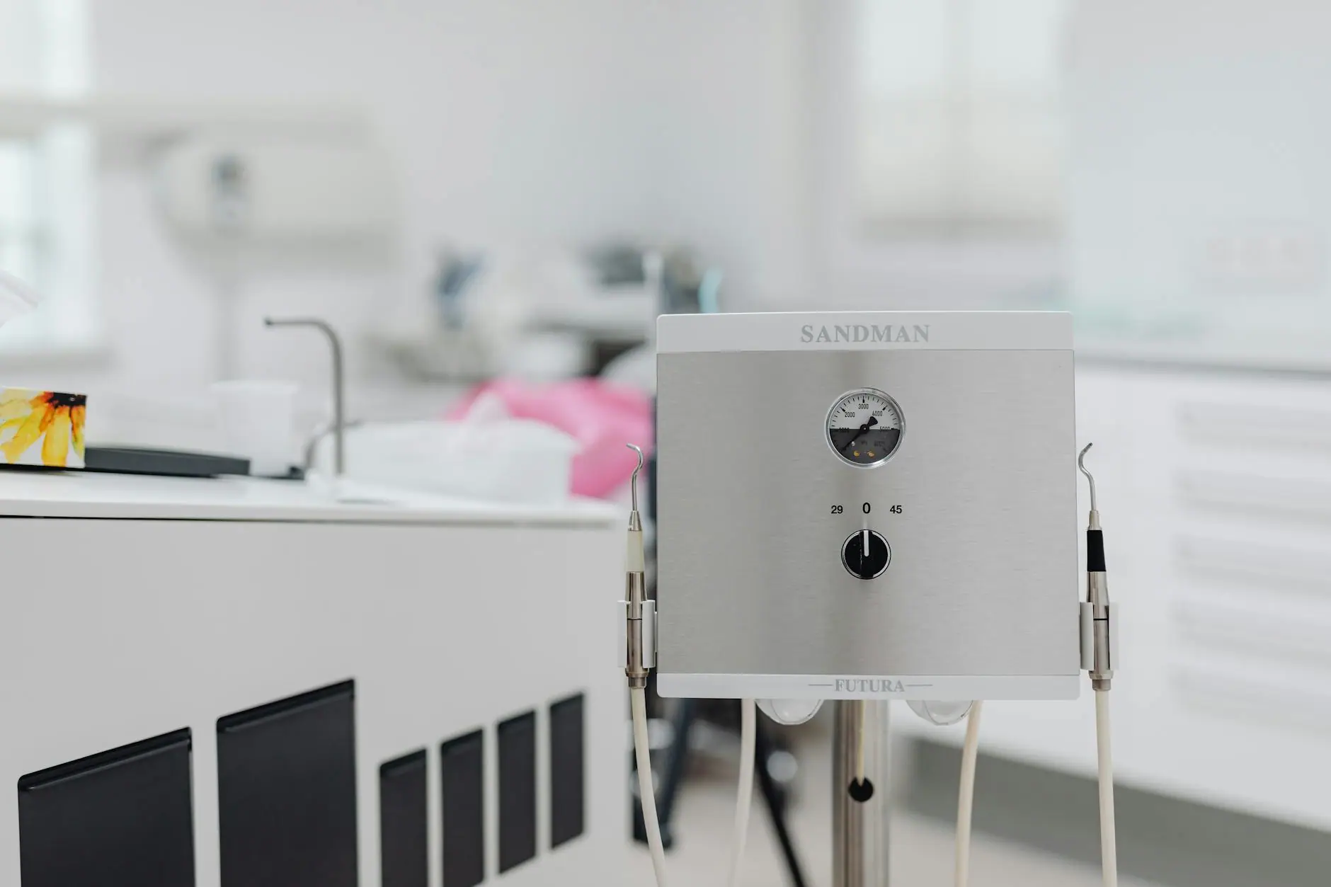 Close-up of dental equipment in a modern, sterile dentist office, highlighting advanced healthcare technology.